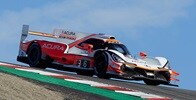 Acura Motorsports ARX-05 3/4 view racing at 