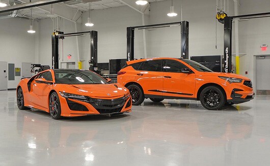 Acura NSX Type S and MDX Type S in Thermal Orange Pearl.