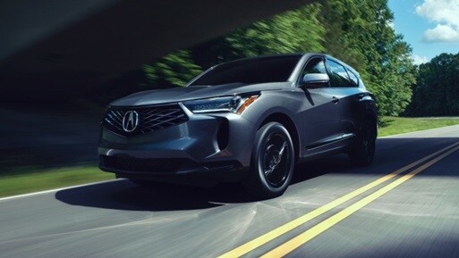 RDX rear 3/4 action shot in Liquid Carbon Metallic