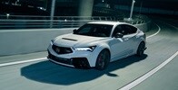 Acura Integra Type S in Platinum White Pearl on the road