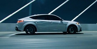 Acura Integra Type S shown in Platinum White Pearl in profile view