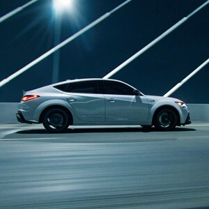 Acura Integra Type S shown in Platinum White Pearl in profile view