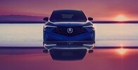 Acura 2025 ADX A-Spec with Advance Package in Adriatic Sea Blue Metallic front view with Diamond Pentagon Grille