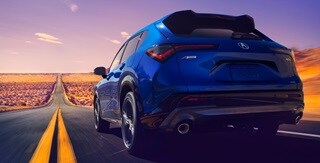 Acura 2025 ADX rear view on the road