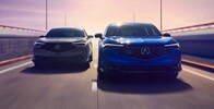 Two Acura 2025 ADX driving in a highway, front view