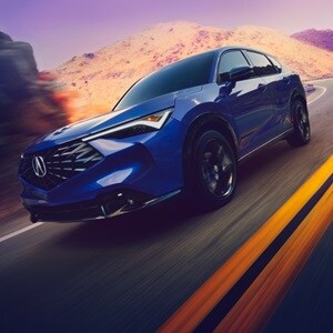 Acura 2025 ADX A-Spec with Advance Package in Adriatic Sea Blue Metallic on the road