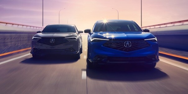Two Acura 2025 ADX driving in a highway, front view