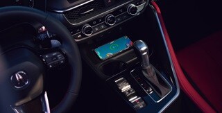 Acura 2025 ADX A-Spec Package with Red Interior with a leather-wrapped flat-bottom steering wheel