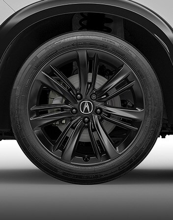 2026 Acura ADX shown in Platinum White Pearl featuring the 19-in Berlina Black Alloy Wheels accessories.