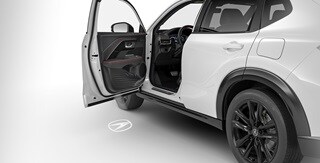 2026 Acura ADX Interior featuring the Logo Pattern Projector accessory.