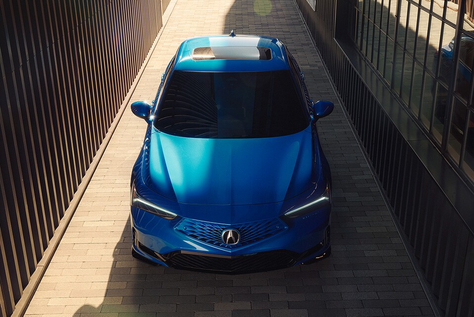 2026 Acura Integra A-Spec with Technology Package in Double Apex Blue Pearl, top front view (Premium Sport Compact).