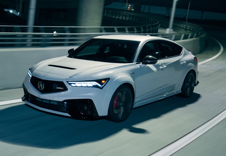 2025 Acura INTEGRA TypeS  Tiger Eye Pearl driving on road