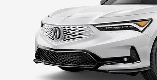 2026 Acura Integra shown in Platinum White Pearl featuring the Front Grille.