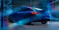 2026 Acura Integra A-Spec with Technology Package in Double Apex Blue Pearl rear view.