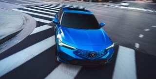 2026 Acura Integra in Double Apex Blue front view.