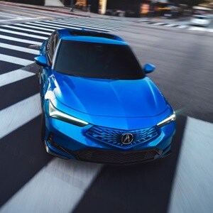 2026 Acura Integra in Double Apex Blue front view.