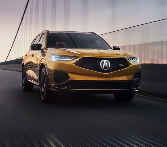 2022 Acura MDX Overview Features Performance Exterior view in action on bridge