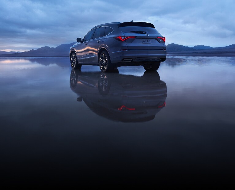 2026 Acura MDX with Advance Package in Liquid Carbon Metallic back with a dramatic reflection (Premium Performance SUV).