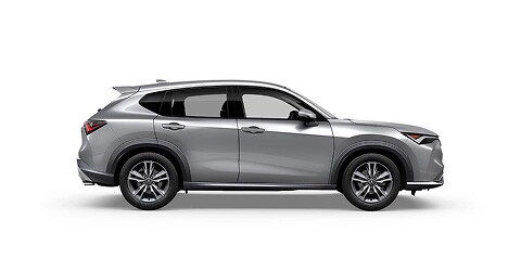 Acura 2026 ADX shown in Solar Silver Metallic, side view (Premium Compact SUV).