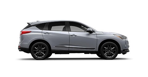 Acura 2026 RDX shown in Solar Silver Metallic, side view (Premium Sport Crossover SUV).